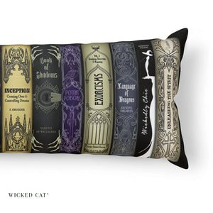 Close up of a decorative body pillow with a row of Halloween books design.