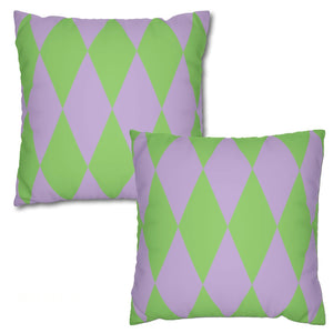 Two green and purple patterned pillows on a white background
