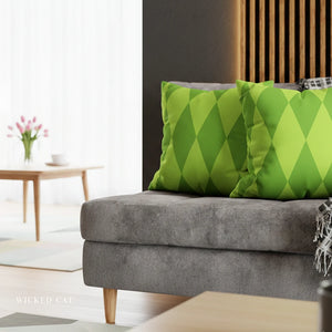 Gray sofa with green patterned cushions in a living room setting