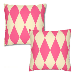 Two pink and beige patterned pillows on a white background