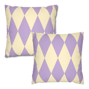 Two purple and beige patterned pillows on a white background