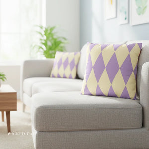 Gray sofa with purple and yellow patterned cushions in a living room setting.