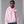 Person wearing a pink hoodie with a heart design on a gray background