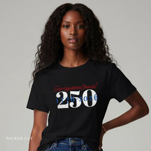 Woman wearing a black t-shirt with 'Semiquincentennial 250 1776-2026' embroidered text on a gray background