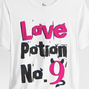 Person wearing a dark gray t-shirt with 'Love Potion No 9 Witchy Woman' design on a plain background