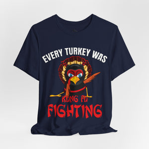 Red t-shirt with 'Kung Fu Fighting Turkey 80s Music Funny' design on a white background