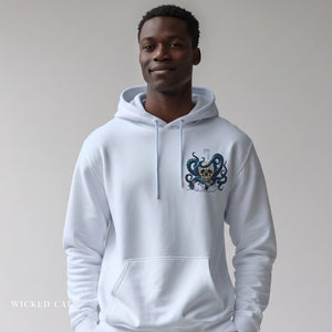 Person wearing a white hoodie with a skull graphic design on a plain background
