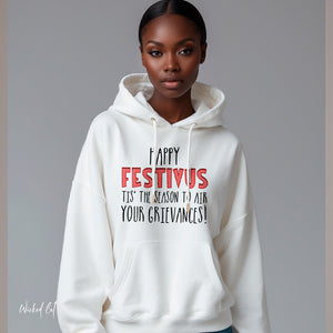 Person wearing a Crimson hoodie with 'Happy Festivus Funny Christmas' design on a plain background