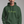 Person wearing a green hoodie with 'Ew, People' text on a gray background