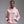 Person wearing a pink hoodie with 'Ew, People' text on a gray background