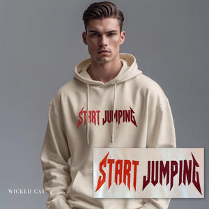 Man wearing a beige hoodie with 'START JUMPING' text, standing against a gray background.
