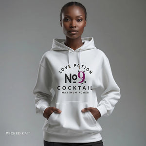 Person wearing a denim blue hoodie with 'Love Potion No 9' design on a plain background
