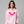 Woman wearing a pink hoodie with bat wings design on a gray background