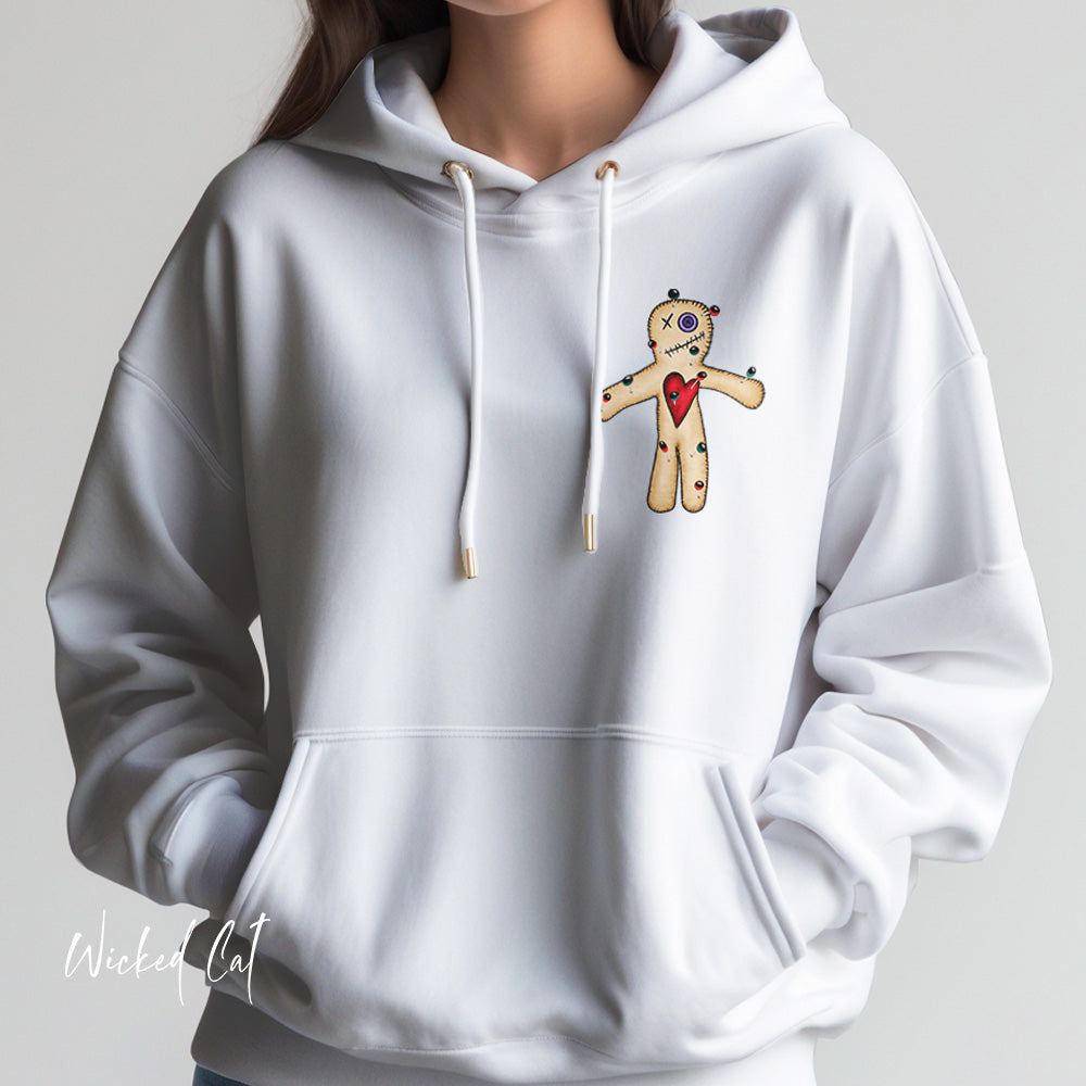 White hoodie with a voodoo doll design on a white background