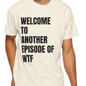 Person wearing a pink t-shirt with 'WTF Funny Sarcastic' design on a plain background