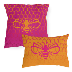 throw pillow with 'Honeycomb Bee Reversible Pink & Orange' design
