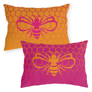 throw pillow with 'Honeycomb Bee Reversible Pink & Orange' design