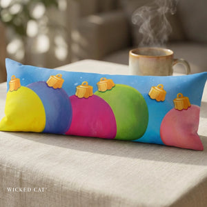 A long rectangular lumbar pillow featuring a colorful abstract design with yellow, blue, purple, pink, and green curved shapes on a light blue background, decorated with big pastel ornaments, 