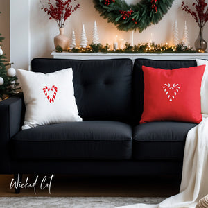 throw pillow with 'Reversible Candy Cane Heart Outdoor' design