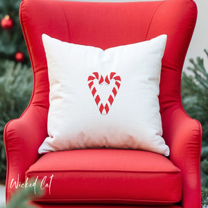 throw pillow with 'Reversible Candy Cane Heart Outdoor' design