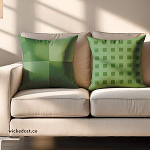 Two green checkered pillows on a beige sofa with a blurred background