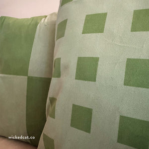 throw pillow with 'Green Geometric Reversible Cover' design