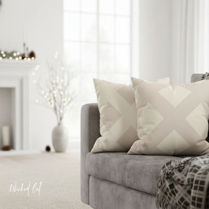 Gray sofa with patterned cushions in a cozy living room setting