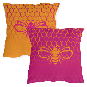 throw pillow with 'Honeycomb Bee Reversible Pink & Orange' design