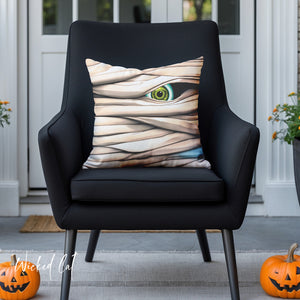 throw pillow with 'Mummy Eye Spooky Halloween Outdoor Indoor' design