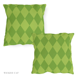 Two green argyle patterned pillows on a white background with 'Wicked Cat' branding.