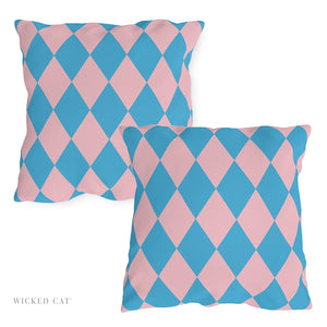Two pink and blue checkered pillows on a white background with 'Wicked Cat' branding.