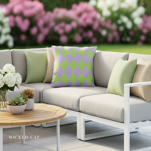 Outdoor patio set with a beige sectional sofa, colorful pillows, and a wooden coffee table.