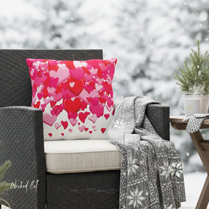 Heart-patterned pillow on a chair with a snowy background