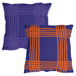 Two plaid-patterned pillows, one purple and one with a blue and orange plaid design, on a white background.