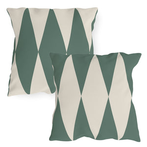 Two square outdoor throw pillows with a diamond pattern in beige and green colors.