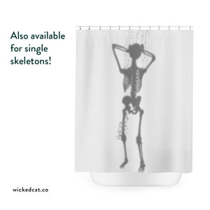 Shower curtain with 'Skeleton Couple' pattern in a bathroom setting