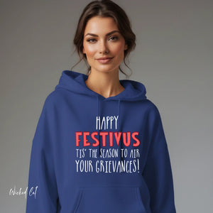 Woman wearing a blue hoodie with Festivus text on a gray background