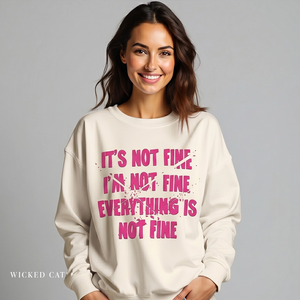 Woman wearing a white sweatshirt with pink text on a gray background