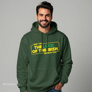Man wearing a green hoodie with text on a gray background