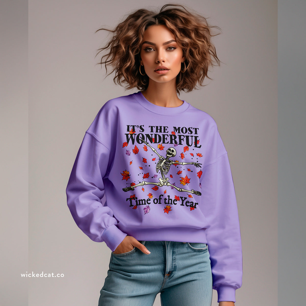 Yellow Halloween sweatshirt with skeleton design and text 'It's the most wonderful time of the year' on a white background
