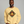 Man wearing a yellow sweatshirt with a graphic design on a gray background