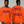Front and back image of man wearing an orange sweatshirt, on the front it reads Start Jumping, on the back it reads Rock the World