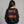 Woman facing back wearing a black sweatshirt that says Rock the World on the back