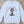 Blue sweatshirt with a graphic of a cat tangled in Christmas lights and text the says 'I Regret Nothing'.