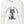 Close up of a white sweatshirt with a graphic of a cat tangled in Christmas lights and text the says 'I Regret Nothing'.