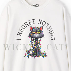 Close up of a white sweatshirt with a graphic of a cat tangled in Christmas lights and text the says 'I Regret Nothing'.