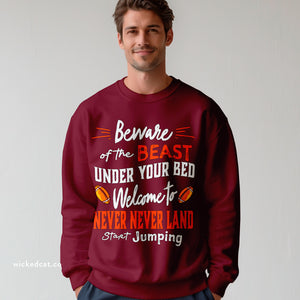 Person wearing a sweatshirt with 'Virginia Tech Football Game Day' design on a plain background