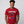 Man wearing a red patriotic t-shirt with 'Kicking Kings to the curb since 1776' graphic and text.