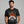 Man wearing a black t-shirt with 'Turkey Time Tequila' design on a gray background