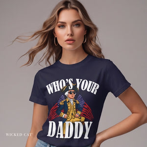 Woman wearing a navy blue t-shirt with 'WHO'S YOUR DADDY' July 4th graphic design on a plain background